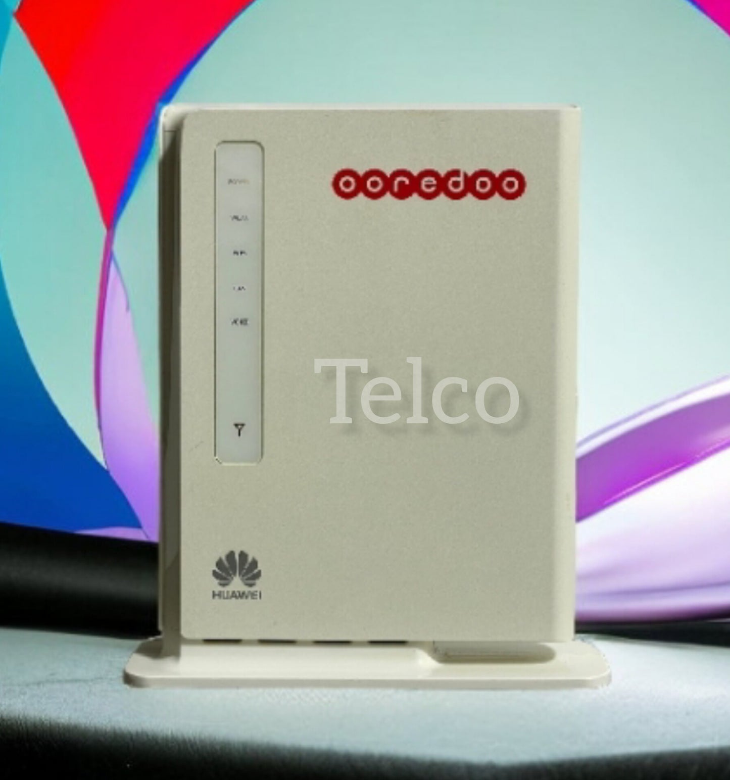 A white Huawei 4G WiFi router with the brand name 'Telco' printed on the front, displayed against a colorful background.