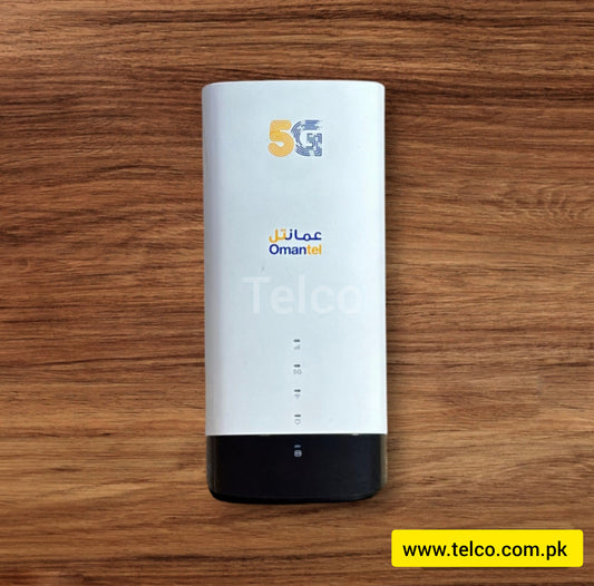 A white 5G mobile router with the branding 'OmanTel' on the front, placed on a wooden surface.
