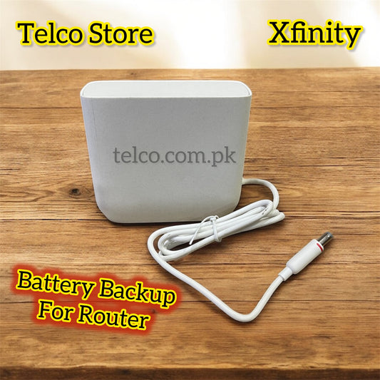 Battery backup for router on a wooden surface with Telco Store and Xfinity branding.